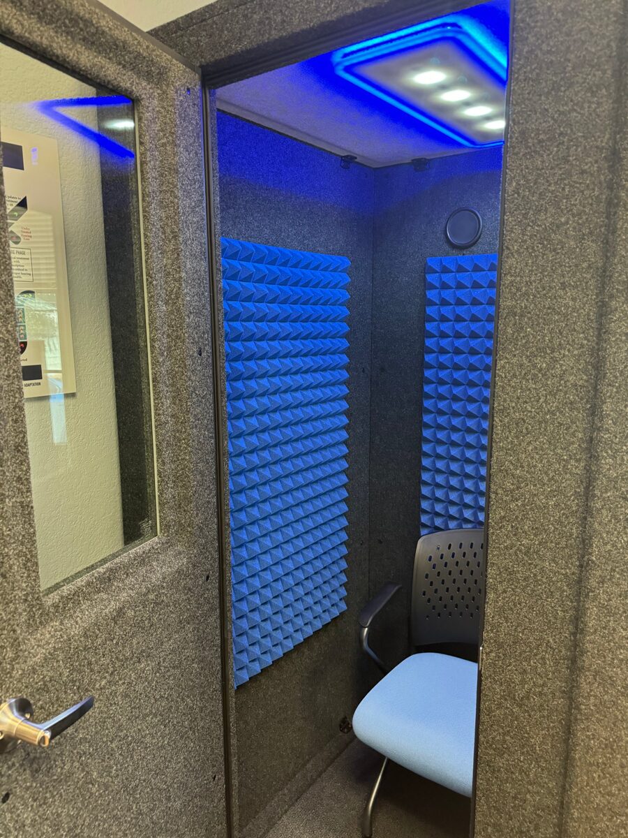 The sound-treated testing booth at Serenity Hearing Aid Centers used for real ear measurement and verification